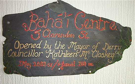 Plaque commemorating opening of Bah' Centre